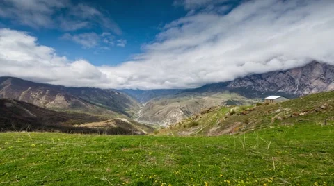 Time lapse. The formation of clouds over alpine meadows. Stock Footage 50685339