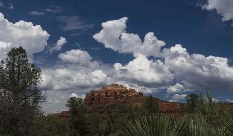 Time lapse of forming clouds over red rock cliffs in Sedona, AZ Stock Footage 92358821