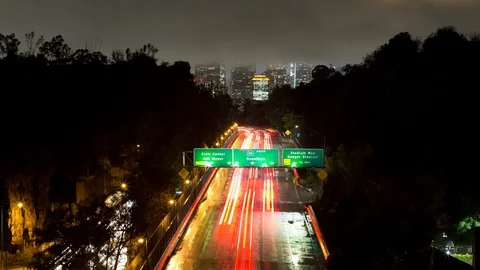 Time Lapse Of A Freeway And Clouds Covering The Tops Of Los Angeles Buildings 스톡 동영상 117298695