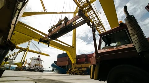 Time Lapse of Freight Ship With Working Crane Bridge Video stock 61738594