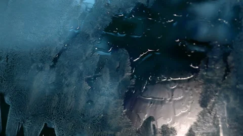 Time lapse of frost forming on a window filmed with a macro lens in HD. Stock Footage 66517820