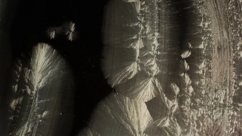 Time lapse of frost forming on a window filmed with a macro lens in HD. Stock Footage 104557738