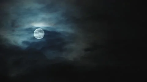 Time-lapse of a Full Moon and Clouds at Night Stock Footage