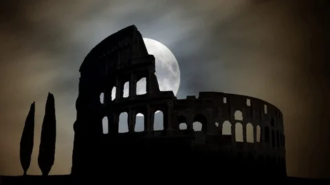 Time Lapse with Full Moon, Clouds and Iconic Monument Colosseum in Silhouette Stock Footage 100689816
