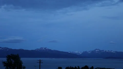 Time lapse: Full moon over Alaskan mountains Stock Footage 39817320