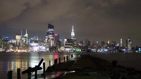 Time-lapse of the Full Moon rising next to the Empire State Building​ Stock Footage 68053692