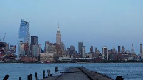 Time-lapse of the Full Moon rising behind the Empire State Building​ at Sunset Stock Footage 68053879