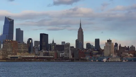 Time-lapse of the Full Moon rising at sunset over the Empire State Building Stock Footage 74133152