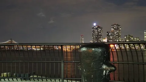 Time-lapse of the Full Moon rising at night from behind the clouds in New York Stock Footage 74133368