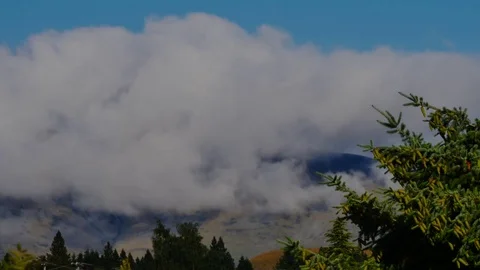 Time lapse of gathering clouds on hillside Stock Footage 103506231