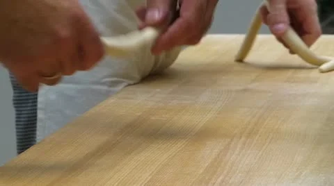 Time-lapse German knot-like shape Brezell Brezel making Stock Footage