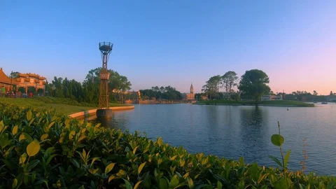 Time lapse of Germany and Italy Pavillions and blue lake at Epcot Stock Footage 109170761