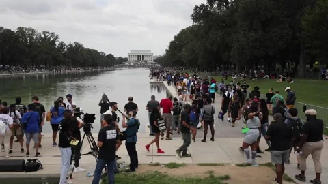 Time-lapse of the "Get off our Necks" Commitment March Stock Footage 138234657