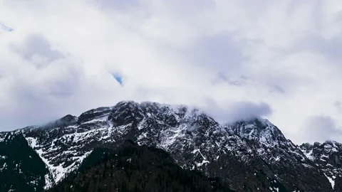 Time lapse of Giewont peak with clouds rolling over it and cross visible on the  Stock Footage 196210041