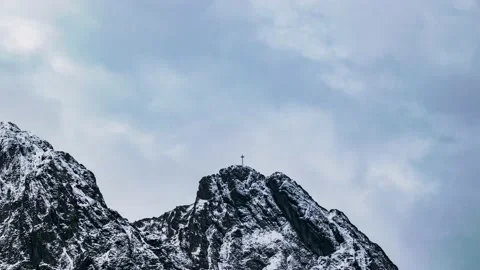 Time lapse of Giewont peak with clouds rolling over it and cross visible on the  Stock Footage 196210069