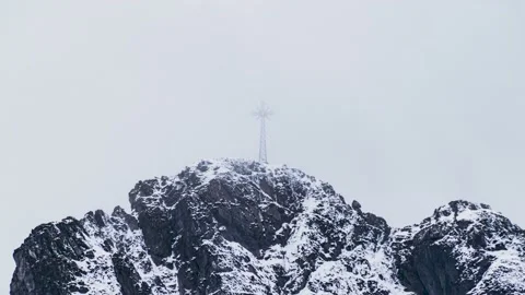 Time lapse of Giewont peak with clouds rolling over it and cross visible on the  Stock Footage 196210222