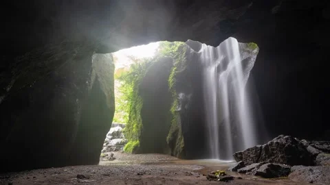 Time Lapse Goa Raja Waterfall Big Water fall inside of a Cave in East Bali Stock Footage 233052916
