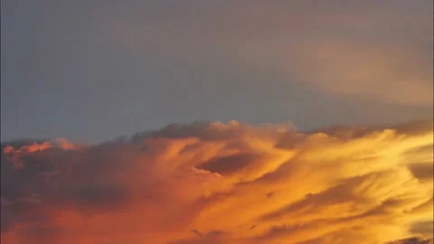 Time lapse gold color cloud and blue sky in magic hour at sunset Stock Footage 136805590