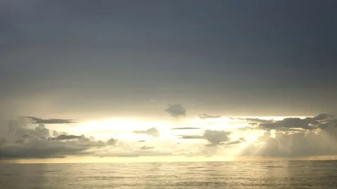 Time Lapse of Golden Hour Clouds Over Ocean Stock Footage 77172049