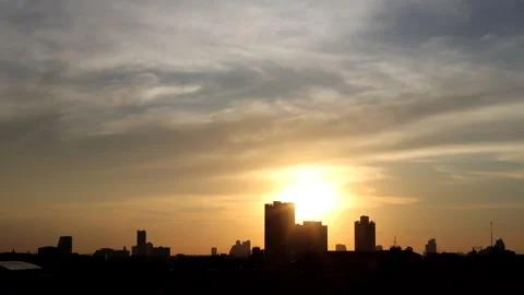 Time-lapse of Golden light pours across the horizon Stock Footage 321628962