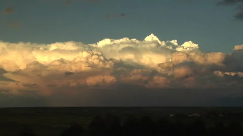 Time Lapse of Golden Storm Clouds at Sunset Stock Footage 54717226