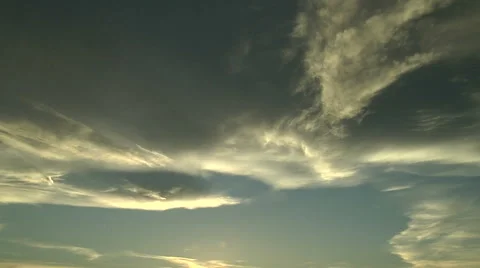 Time Lapse of Golden Wave Clouds at Sunset Stock Footage 54737780