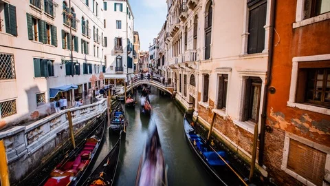 Time Lapse - Gondolas Going Through Grande Canal in Venice Italy - 4K Stock Footage 117163053