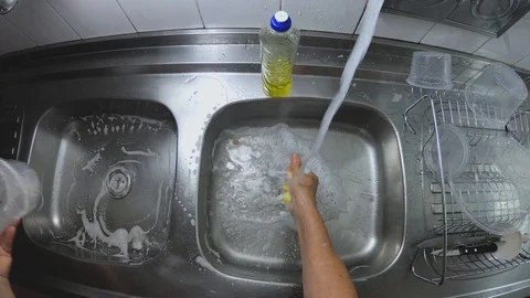 Time lapse. Gopro wide angle. Dish washing routine. Woman washes glasses. Stock Footage 128056281