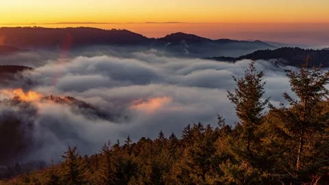 Time lapse of a gorgeous sunset in the Black Forest mountains, fog in the valley Stock Footage 144103714