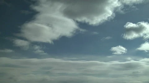 Time Lapse of Gossamer Clouds Streaming along in Winds Stock Footage 54736910