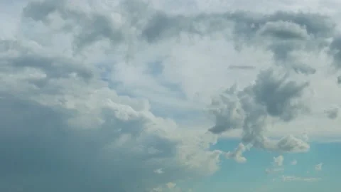 Time Lapse of Gray and White Cumulus Puffy Clouds in a Blue Sky after Rain. Beau Stock Footage 234502837