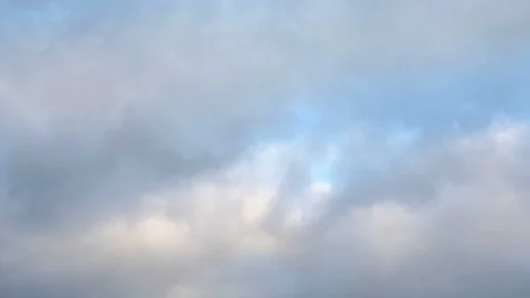 A time lapse of the gray clouds running across sky Stock Footage 103339310