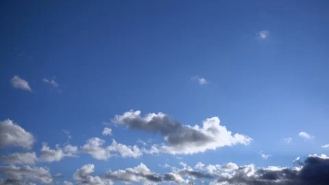 A time lapse of the gray clouds running across sky Stock Footage 104572421