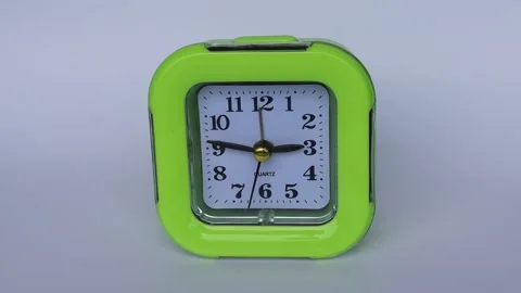 Time Lapse, green alarm clock with black numbers and arrows Stock Footage 195000951