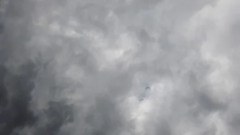Time lapse grey clouds breaking up Stock Footage 113734384