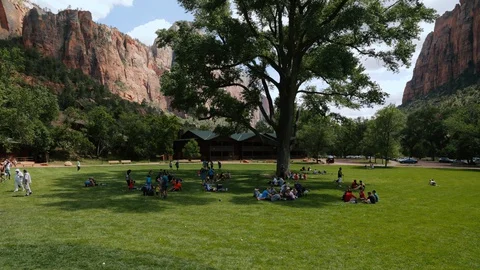 Time-lapse of a group of people in a field in Zion National Park Stock-Footage 128777624