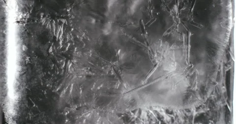 Time lapse of growing crystal formation on water Stock Footage 147953758
