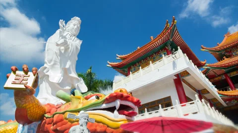 Time Lapse Guan Yin Statue On Big Dragon Statue In China Temple Stock Footage 31534386