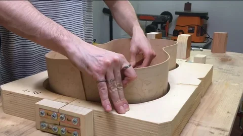 Time lapse of guitar maker building an acoustic guitar body Stock Footage 112007714