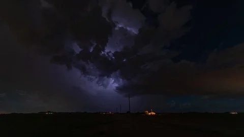 Time Lapse of hail storm lightning approaching small farm house in the desert 스톡 동영상 103110767