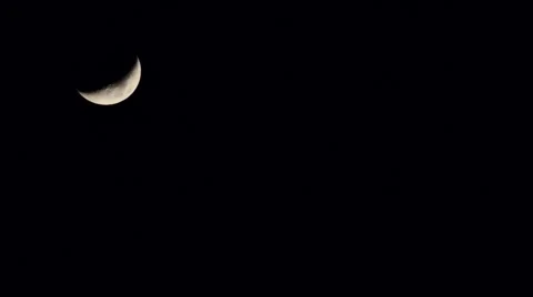 Time Lapse half moon and clouds flowing fast before Super Moon. Stock Footage 58388103