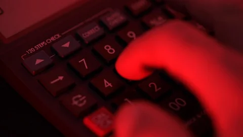Time lapse of hand on calculator. Red light. Investment and economy concept Stock Footage 128208849