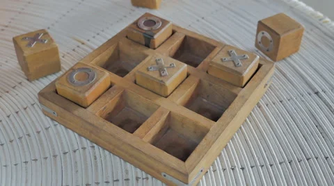Time lapse of hands playing Tic Tac Toe game Stock Footage 62776573