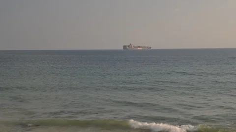 Time lapse of Hapag Lloy ocean-going oil tanker ship with containers Stock Footage 94658751