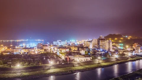 Time  Lapse - Harbor Town at Night - 4K Stock Footage 100658184