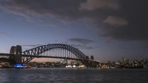 Time Lapse of Harbour Bridge at Dusk from Circular Quay Sydney Cove, Australia Vidéo 76786439