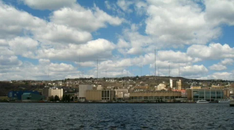 Time lapse HD 720p clouds passing over downtown Duluth  動画素材 524630