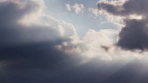 Time lapse of heavenly backlit clouds in motion, with a blue sky background Stock Footage 273267450