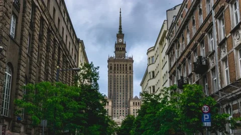 Time lapse of heavy rain clouds rolling behind Palace of Culture and Science  Stock Footage 196214172