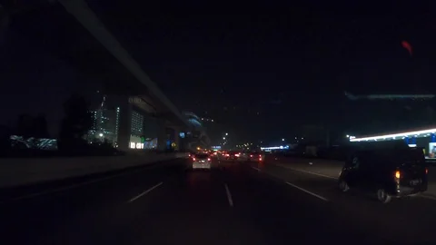 Time Lapse heavy traffic at night time in Jakarta city Stock Footage 114818876